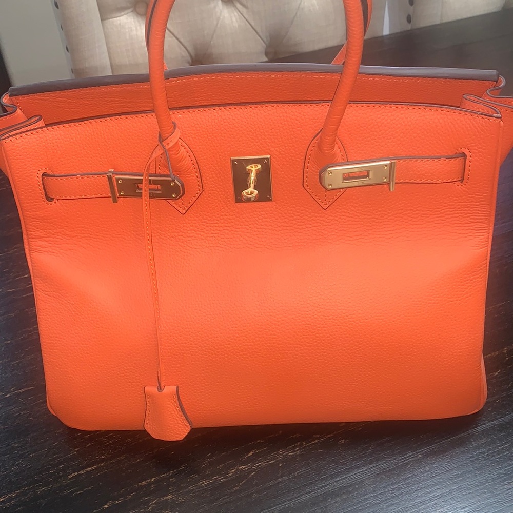 Brand new orange leather bag